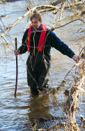 Simon goes for a paddle in the river