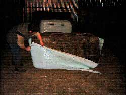 Removing the bale wrapping