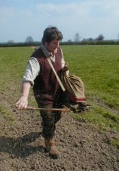 Me using a very old seeding tool known as a fiddle.