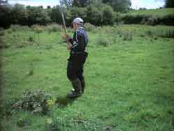 Shaun chopping thistles