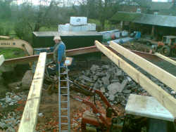 Phil attaching purlin to roof structure