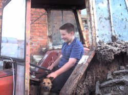 Simon driving the tractor